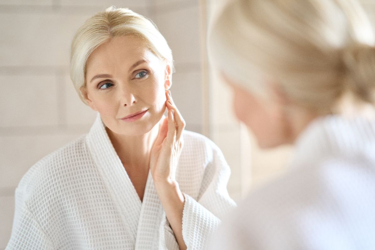 How well are you aging? A woman questions in a mirror